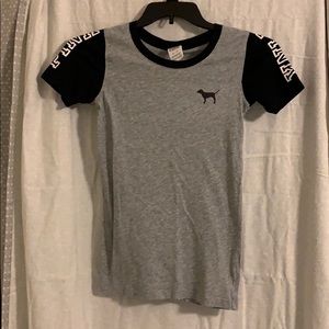 Pink tee shirt in gray with black sleeves
